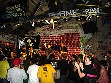 A Band Plays On The Tiny Stage At The Berkeley California Punk Venue At Gilman Street