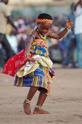A Young Ghanaian Child Doing Akan Adowa Dance Majestically In Her