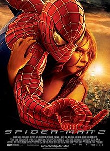 Against A New York City Background Spider Man Hugs Mary Jane Watson With