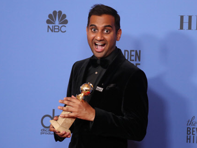 Aziz Ansari Poses With The Award For Best Performance An Actor In A Television Series