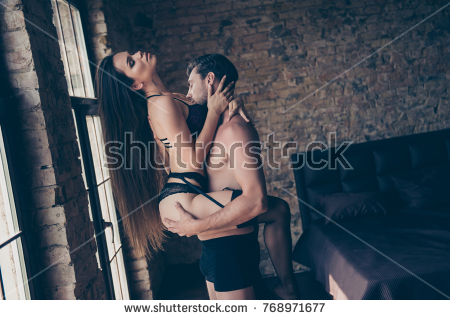 Beautiful Couple Of Long Haired Brunette Lovely Passionate Woman Wearing Seductive Lingerie And Masculine Strong
