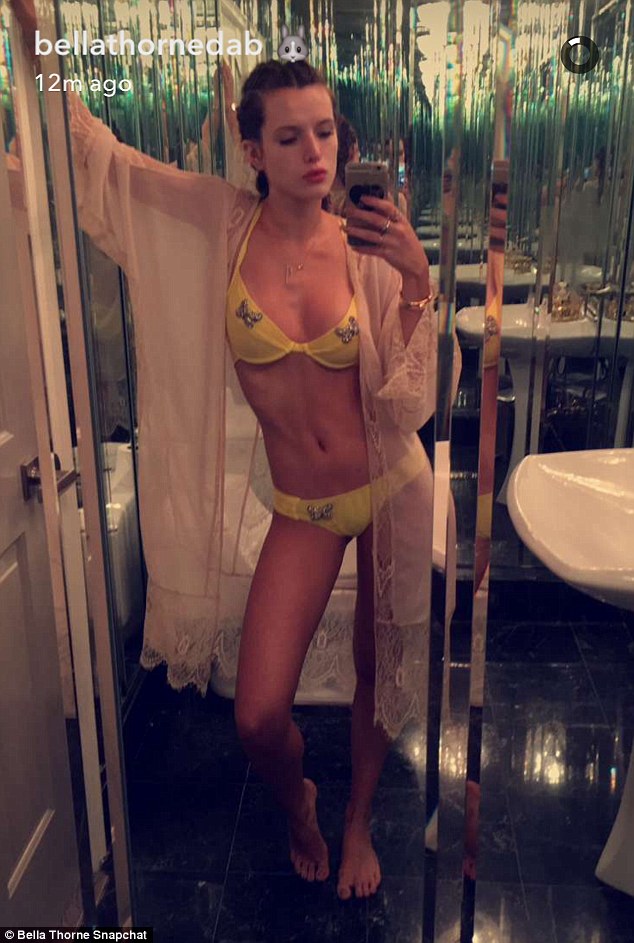 Bella The Social Butterfly Bella Thorne Posed In A Yellow Butterfly Adorned Bikini Via
