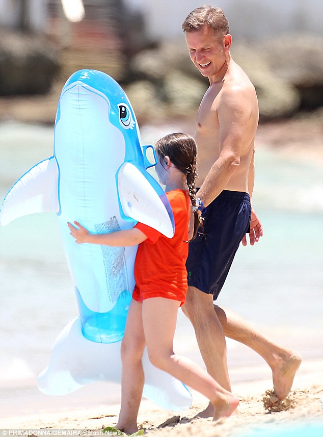 Daddy And Dolphin Presenter Jeremy Kyle Led His Daughter Down The Beach In Barbados
