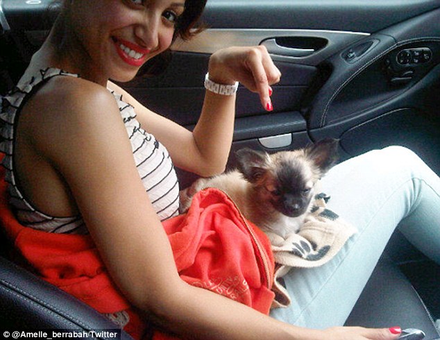 Dog Whisperer Amelle Berrabah Poses With Her New Pet Pooch Herbie In Twitter Photograph