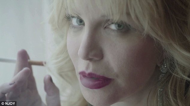 Enjoying Courtney Love Takes A Puff Of An Electronic Cigarette In A New Web
