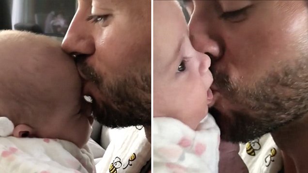 Enrique Iglesias Dotes On Baby Daughter Lucy With Repeated Kisses Daily Mail Online