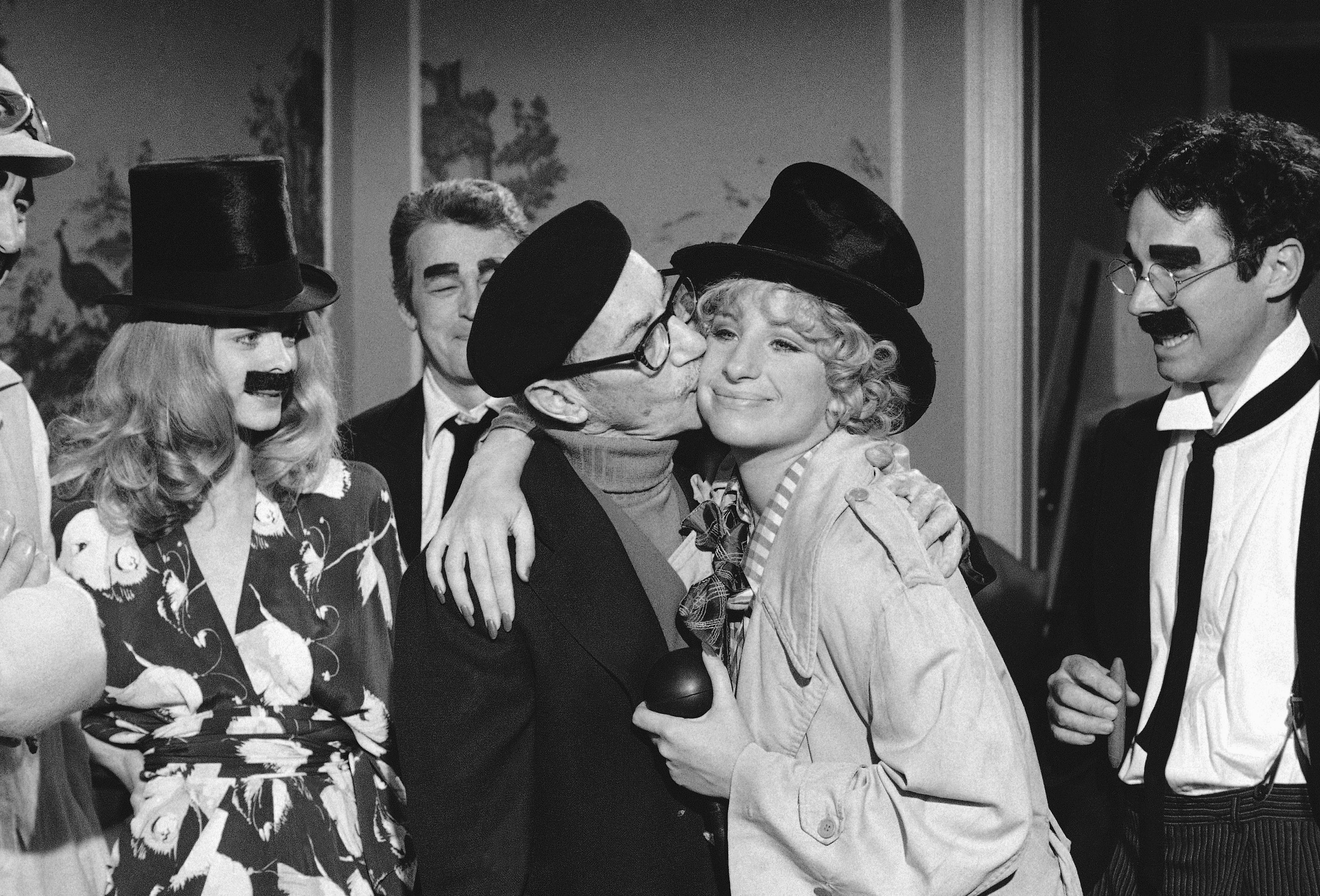 Groucho Marx Has A Kiss For Barbra Streisand As He Visits The Set