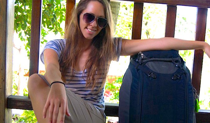 Kristin Addis Female Solo Travel Expert With Her Well Packed Suitcase