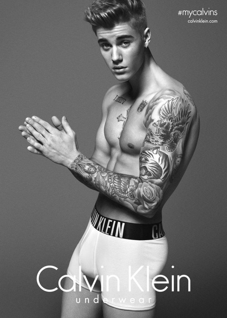 Lara Stone Paws Justin Biebers Naked Chest For Calvin Klein