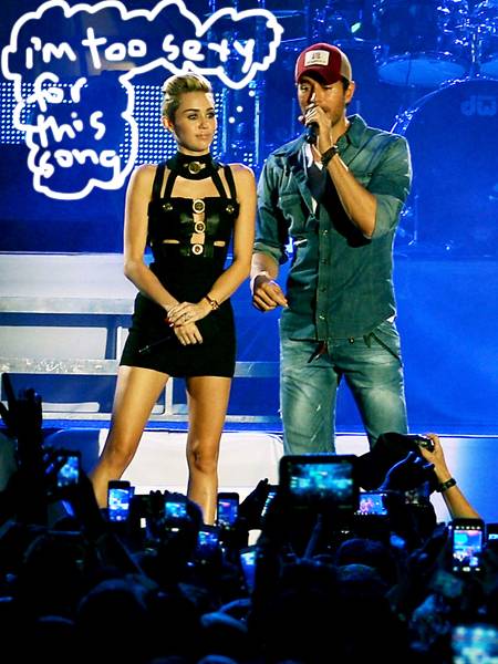 Miley Cyrus Is A Sexy Robot As Enrique Iglesias Serenades Her