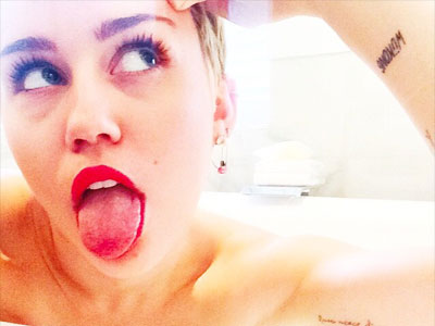 Miley Cyrus Tattoos Meanings Steal Her Style 4