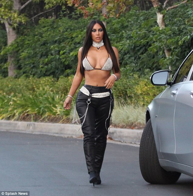 Rock The Boat Kim Kardashian Showed Off Yet Another Halloween Costume Dressed As Late Musician