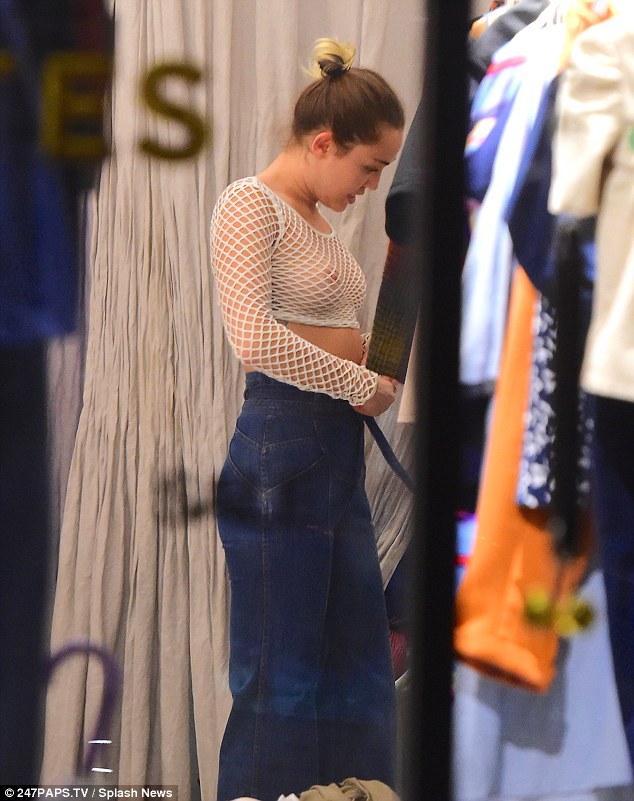 Skimpy Look Miley Cyrus Wore A See Through Mesh Top As She Shopped