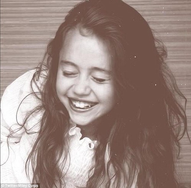 Smiley Cyrus Miley Tweeted This Adorable Picture Of Herself As A Toothy Preteen With Tangled
