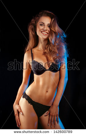 Stock Photo Beauty Woman In Black Lingerie Smiling At Camera In Studio On Black Background