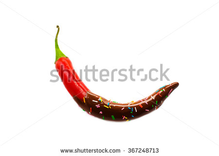 Stock Photo Bitter And Sweet Pepper In Chocolate Red Hot Chili Pepper With Chocolate With Sugar Sprinkle Dots