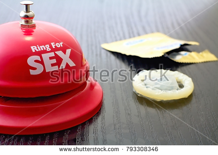 Stock Photo Time For Sex And Exorcism Theme Red Ring With Lettering Ring For Sex And Condom On Light