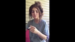Teen Smoking Cigarette Outside With Crazy Hair