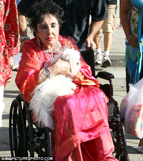 Wheelchair Bound Liz Taylor Stuns In Pink To Help California