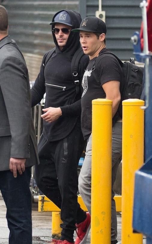 Zac Efron Wearing John Elliott Rue Hoodie In Black Bror Cap Puma Evo Pants